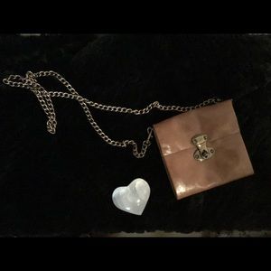 Cross body miniature purse.